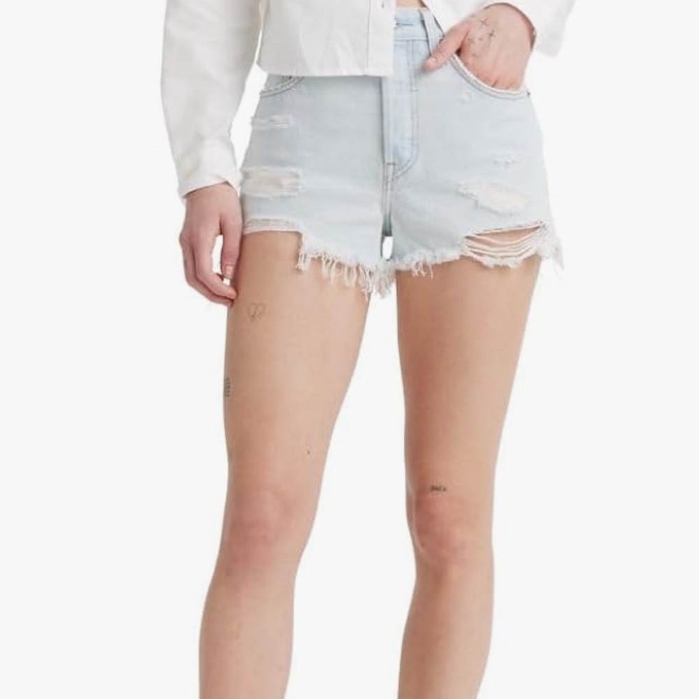 NWT 501 LEVIS. Size 34.  Distressed Light Blue Denim Shorts